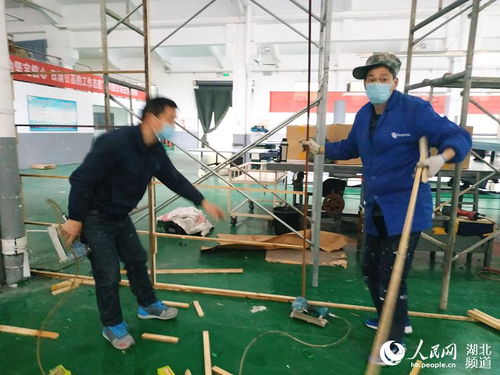 丹江口际华3541服装公司克难复工 生产防护服 口罩等防疫用品