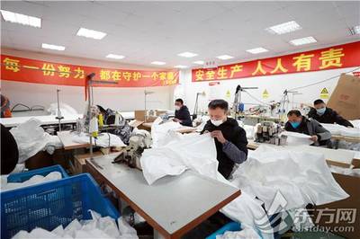 探访上海防护服生产车间:5天从无到有 7天产能翻六倍